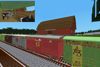 A train of Australian Cattle Vans stops at a siding to pick up some farm animals.