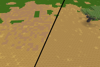 A split screen showing dry dirt on the left and dry grass on the right