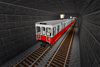 An 01700 Series train runs through a subway tunnel.
