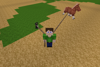 Sam with a penguin and a horse on leads