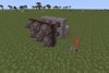 An extendable wall of spikes in MineClone made with log spikes attached to pistons