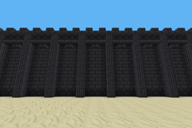 A wall made of deepslate bricks, deepslate pillars, deepslate tiles, and chiselled deepslate